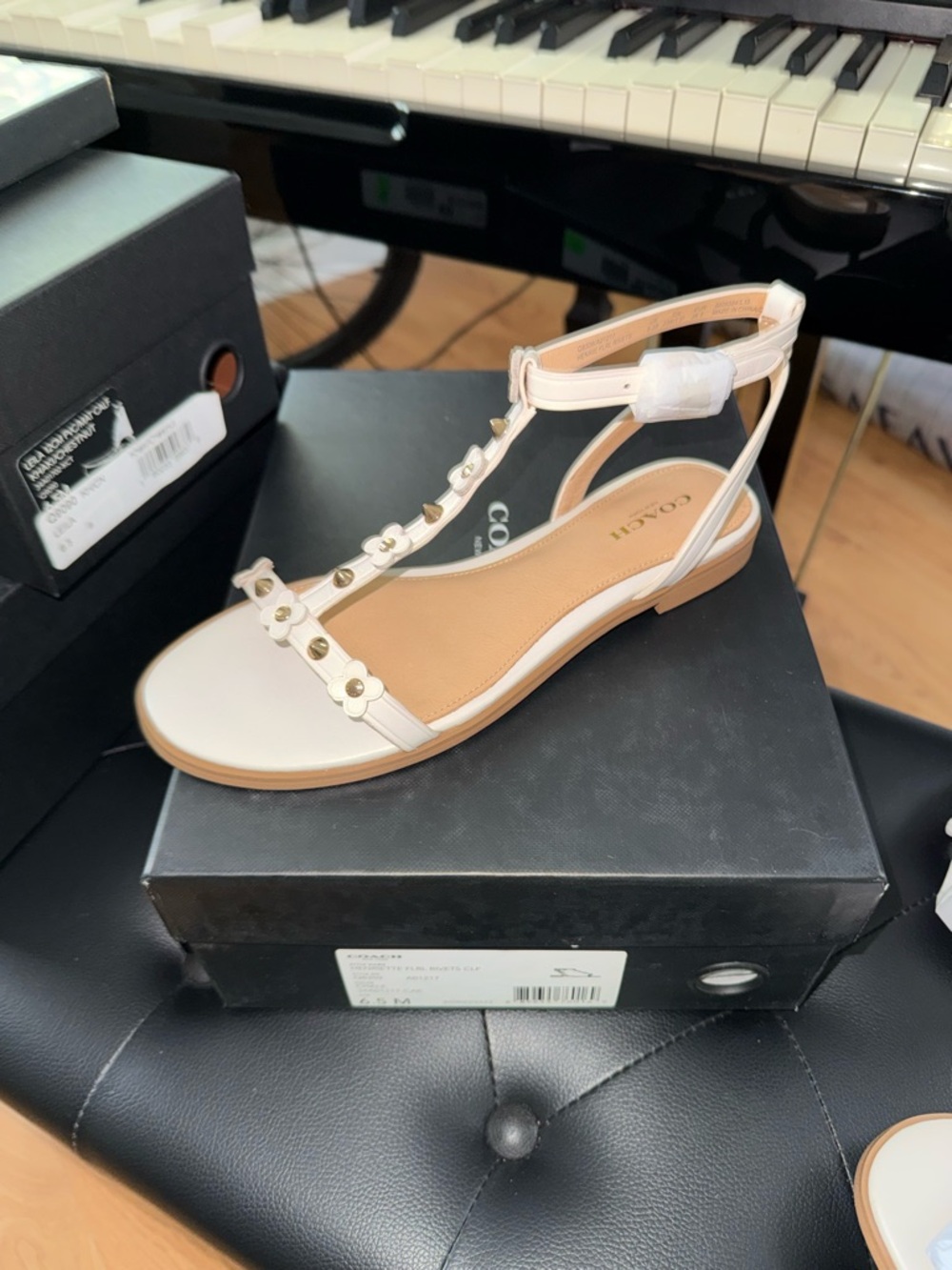 COACH Ivory Floral Stud T-Strap Sandals with Gold Accents